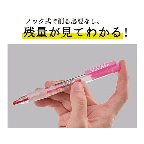 Neon Pitu fluorescent pink pen held in hand showing click mechanism and visible ink level indicator