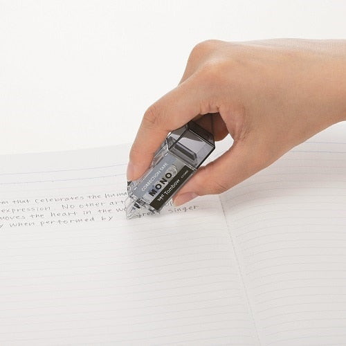 Tombow Mono-Pocket correction tape in-use demonstration on lined notebook paper