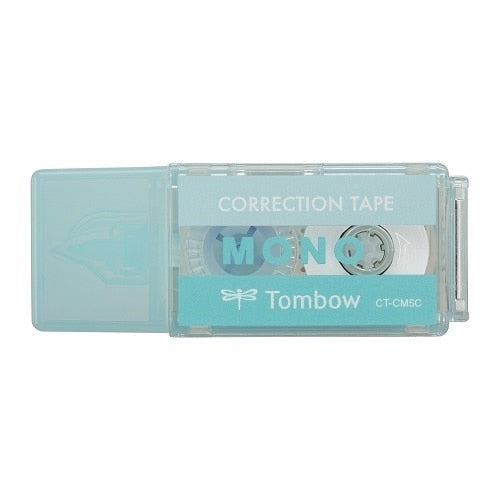Tombow Mono Pocket correction tape dispenser shown at angle displaying turquoise case and tape roll details