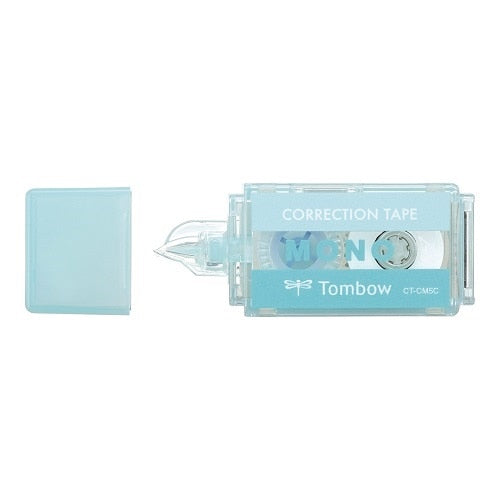 Tombow Correction Tape Mono Pocket with cap removed, showing applicator tip and tape mechanism from side angle