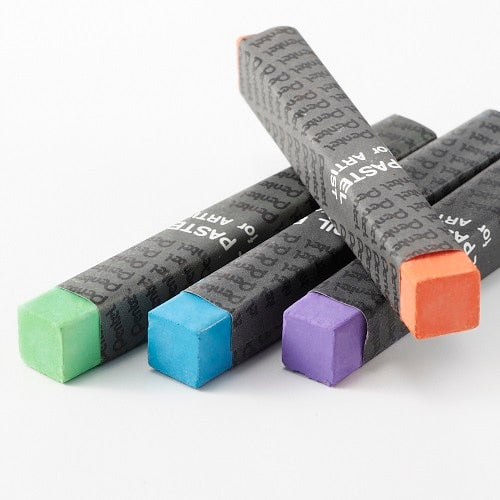 Pentel Pass 49 chalk markers color selection showing green, blue, purple, and coral tips with textured grip barrels.