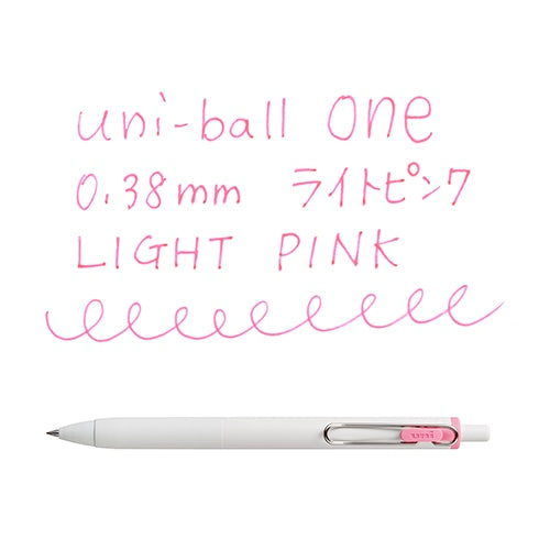 Uni-ball One 0.38mm light pink pen writing sample showing ink color and line consistency