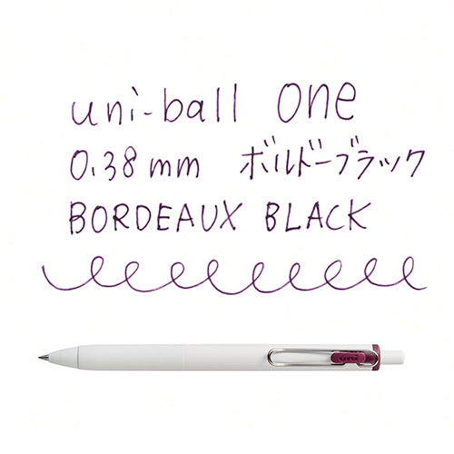 Uni-ball one 0.38mm Bordeaux Black pen writing sample showing ink color and line detail