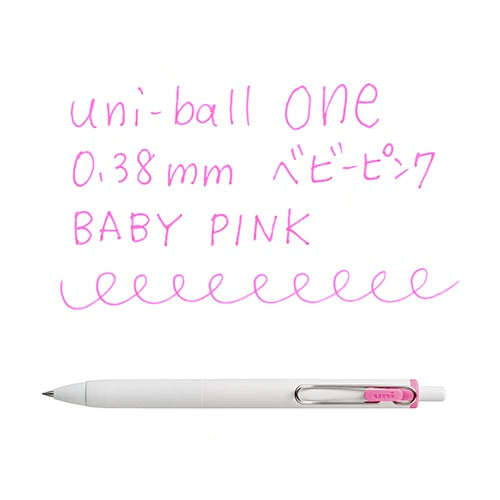 Uni-Ball One 0.38mm Baby Pink pen with writing sample showing line quality and color on white background